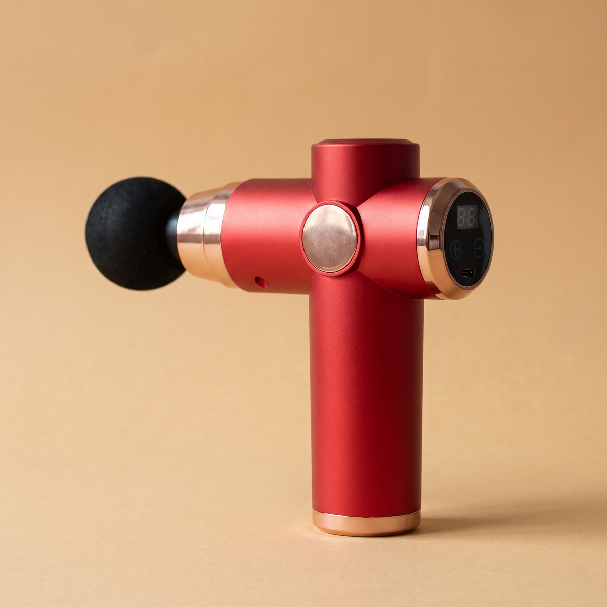 Massage gun in red