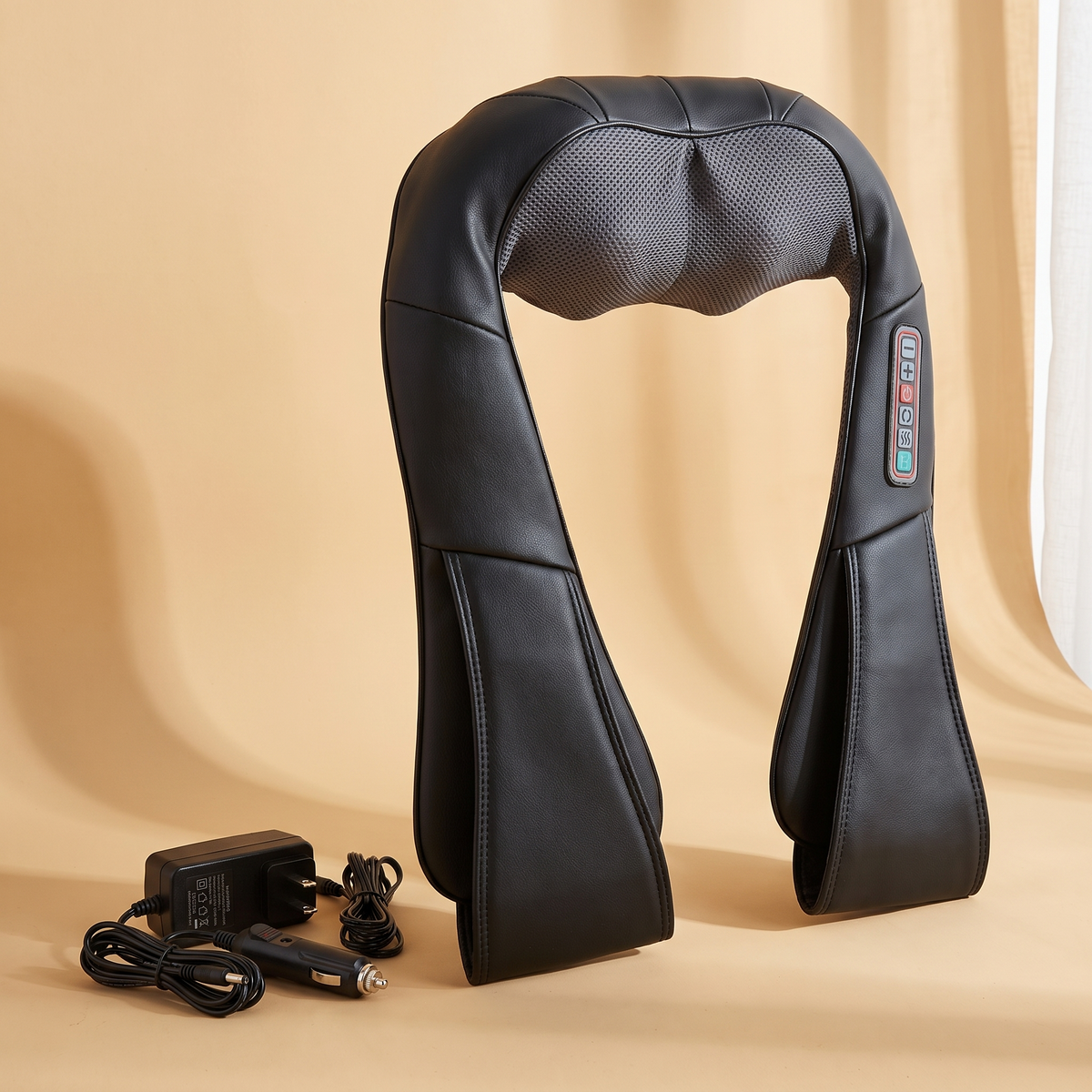 Heated neck and shoulder massager with home and car adapters
