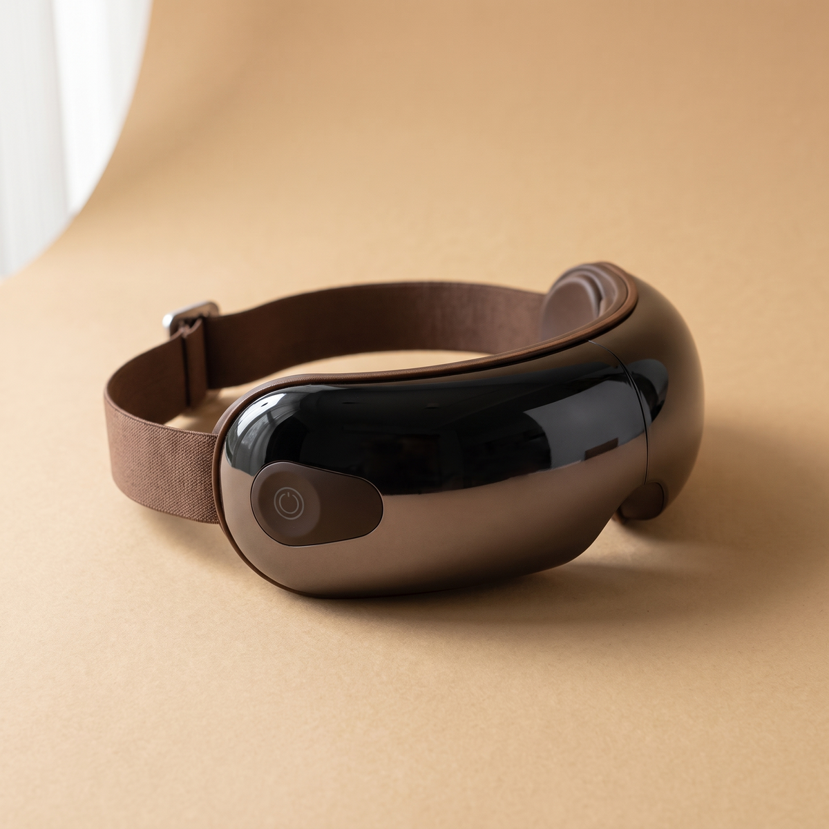 Eye massager in brown